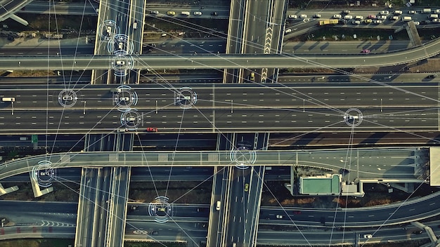 A detailed blueprint of a multi-lane highway interchange overlaid with transparent environmental data visualizations, such as wildlife corridors and wetland boundaries, symbolizing the intersection of infrastructure planning and ecological consideration.