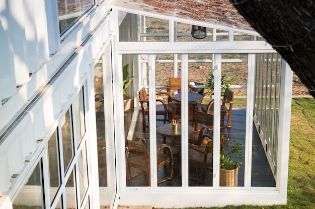A house with newly installed impact-resistant windows, showing thick frames and multi-pane glass. The immediate surroundings are clear and well-maintained, suggesting readiness for various weather conditions.