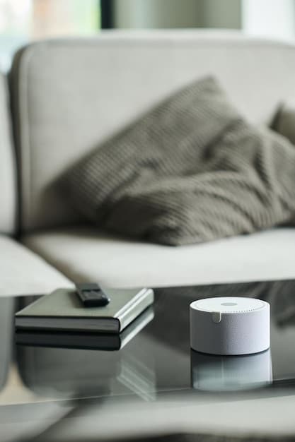 A close-up of a modern smart thermostat displaying a low temperature, with a blurred background of a cozy living room, symbolizing efficient heating.
