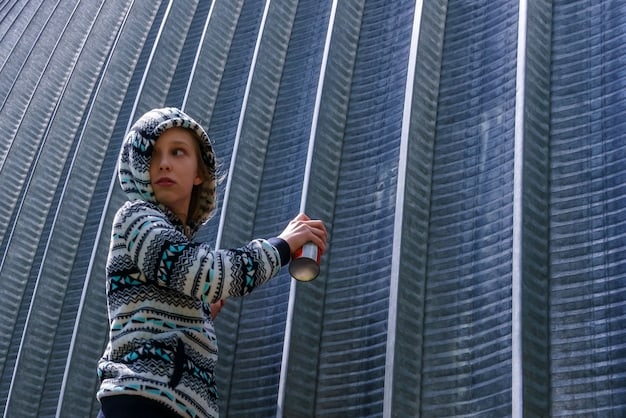 A detailed shot of an individual carefully cleaning the surface of a rooftop solar thermal collector, with a soft cloth and water, emphasizing routine maintenance.