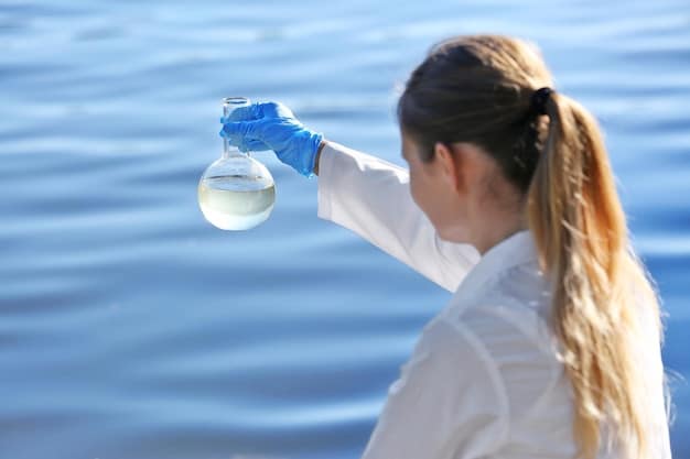 A close-up of a water sample being analyzed in a laboratory, showing a scientist meticulously examining data on a screen, representing meticulous environmental monitoring and compliance.